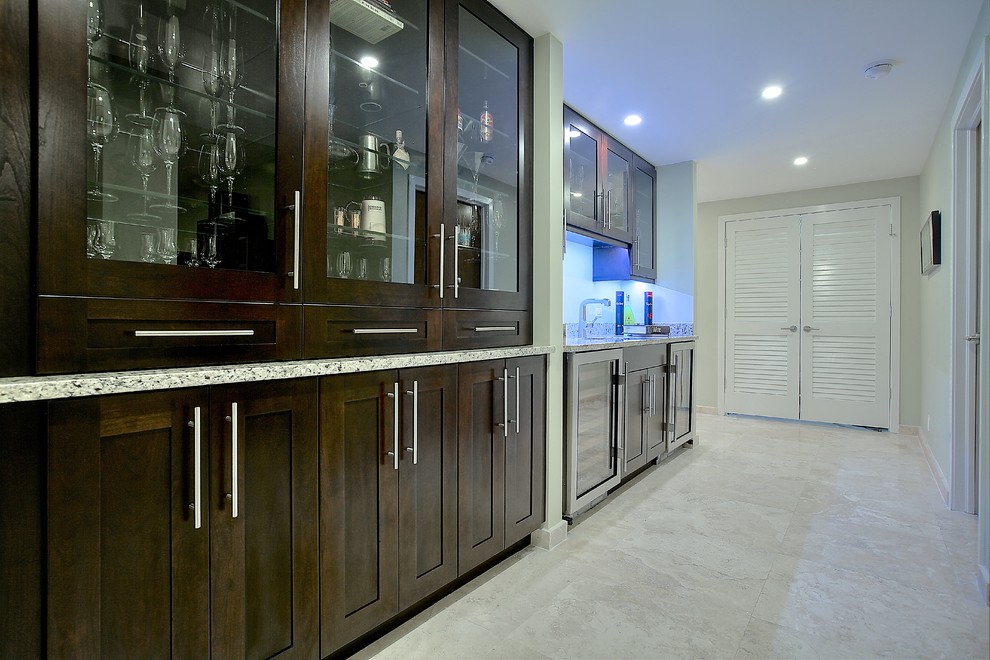 Design ideas for a medium sized traditional single-wall wet bar in Miami with a submerged sink, shaker cabinets, dark wood cabinets, granite worktops and marble flooring.