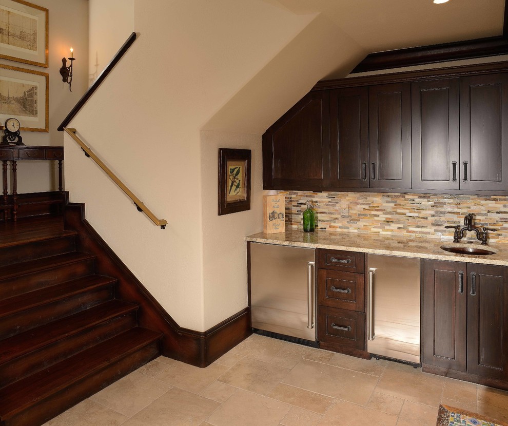 Example of a mid-sized tuscan single-wall wet bar design in Charleston with an undermount sink, shaker cabinets, dark wood cabinets and granite countertops