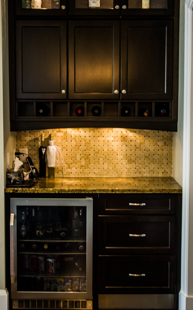Small elegant single-wall dark wood floor wet bar photo in Vancouver with granite countertops, beige backsplash, shaker cabinets, dark wood cabinets and mosaic tile backsplash