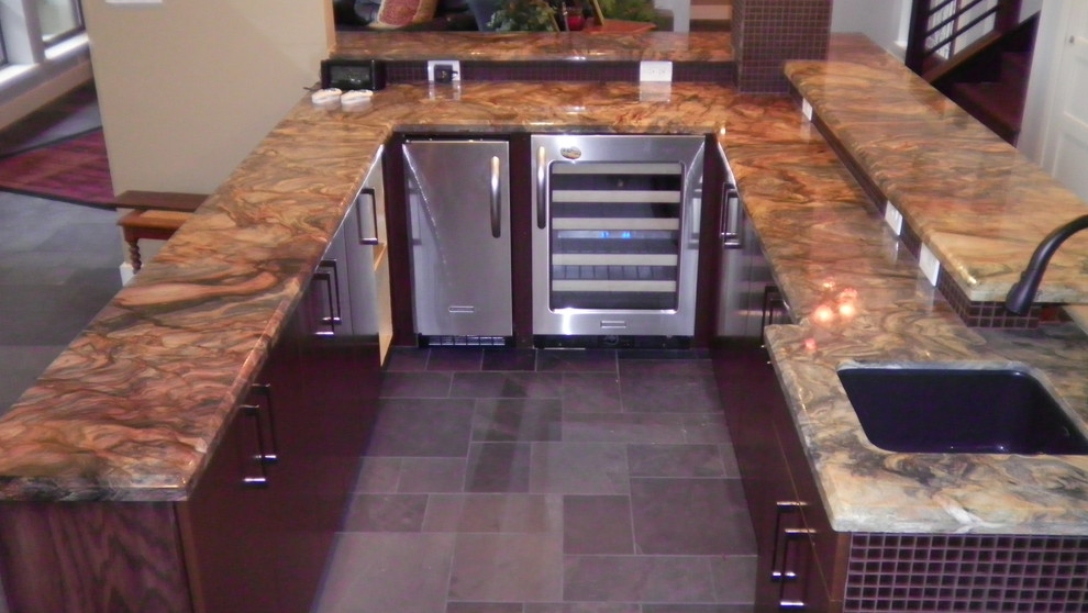 Example of a mid-sized classic u-shaped gray floor seated home bar design in Houston with an undermount sink, flat-panel cabinets, dark wood cabinets and brown backsplash