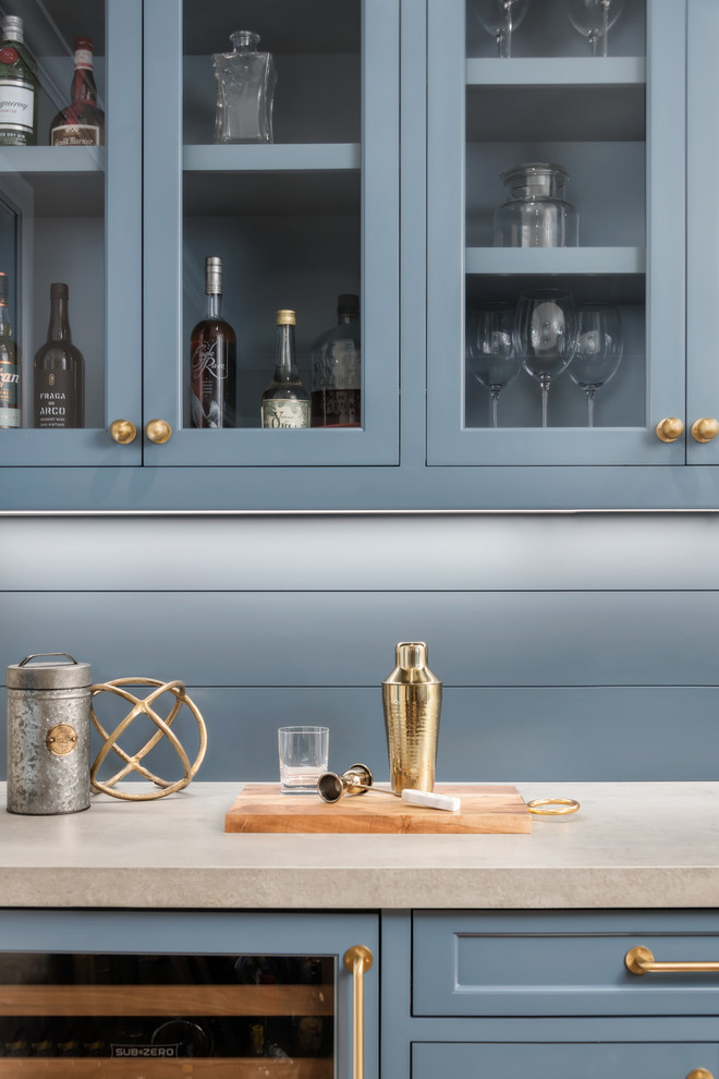 Inspiration for a medium sized country single-wall home bar in San Francisco with beaded cabinets, blue cabinets, engineered stone countertops, blue splashback, wood splashback, medium hardwood flooring, brown floors and grey worktops.