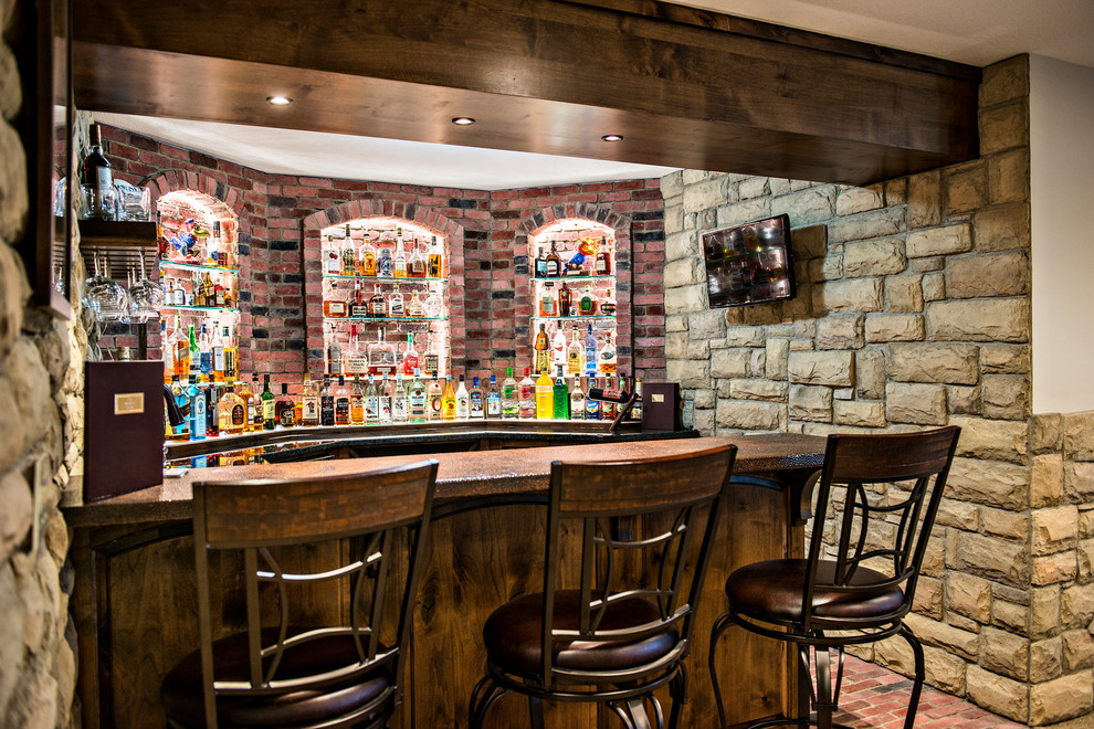 This is an example of a medium sized rustic u-shaped breakfast bar in Kansas City with brick flooring, red floors, a submerged sink, raised-panel cabinets, dark wood cabinets, red splashback and brown worktops.