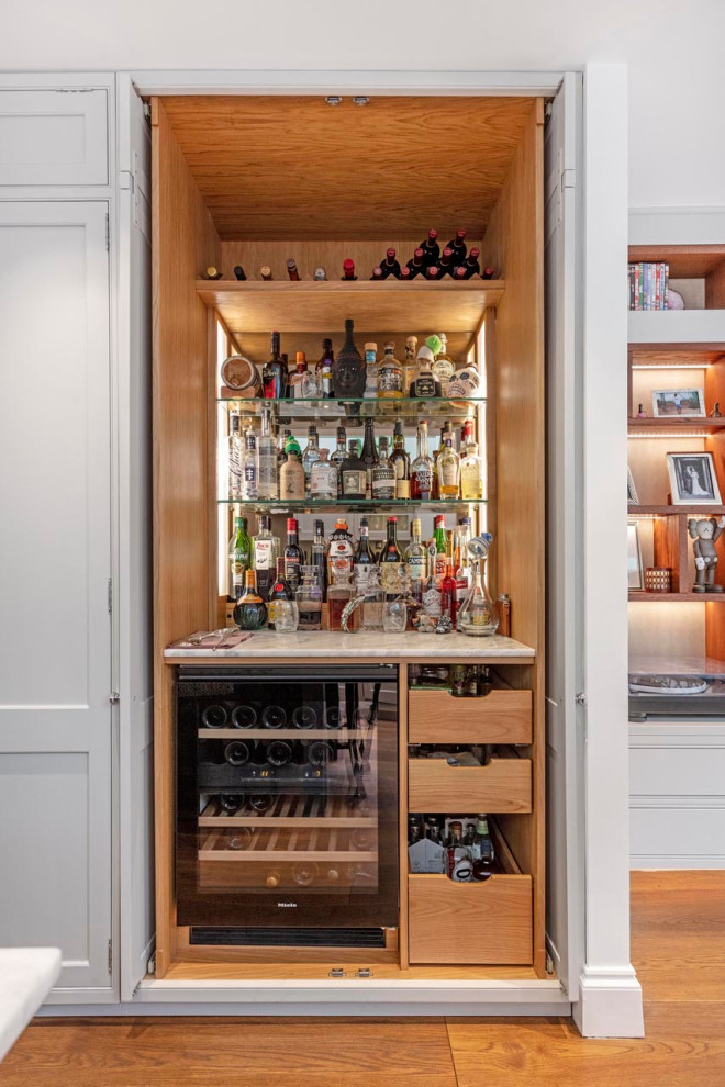 Example of a small trendy single-wall bar cart design in London