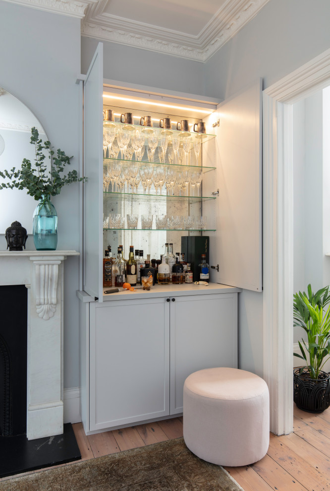 Living room redesign and bespoke home bar creation Contemporary
