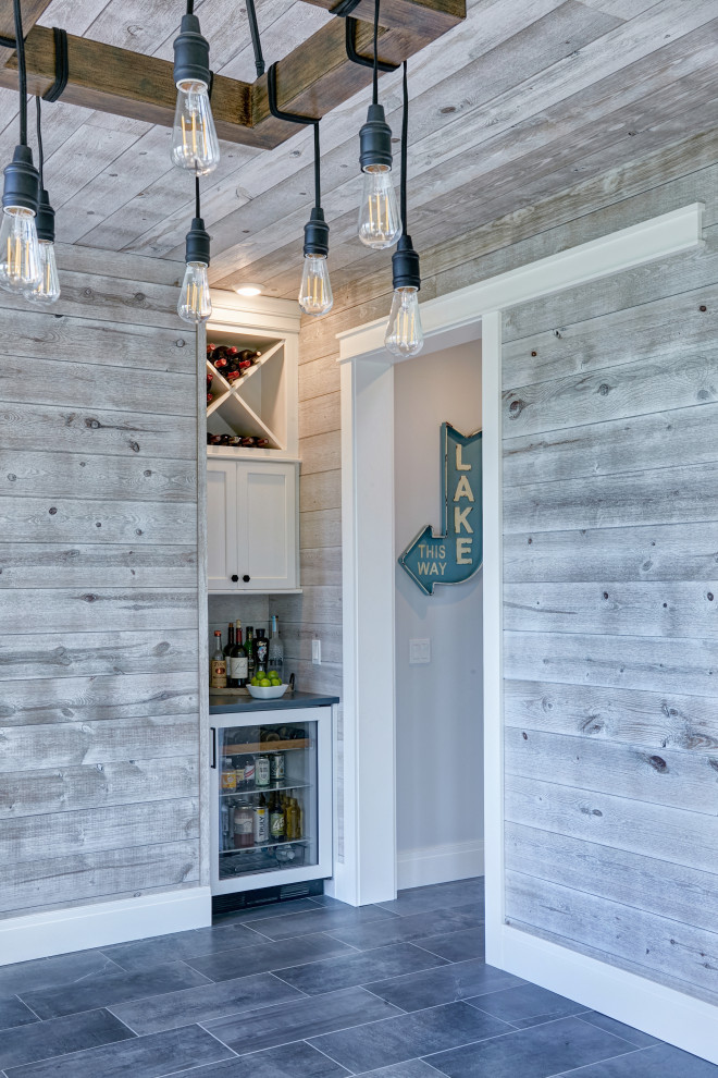 Inspiration for a beach style dry bar in Other with flat-panel cabinets, white cabinets, quartz worktops, grey splashback, tonge and groove splashback, slate flooring, blue floors and blue worktops.