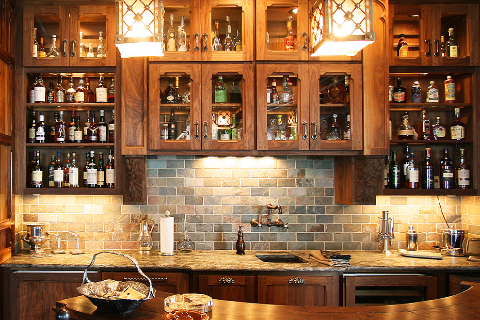 Inspiration for a large classic home bar in Charlotte with dark hardwood flooring and slate splashback.