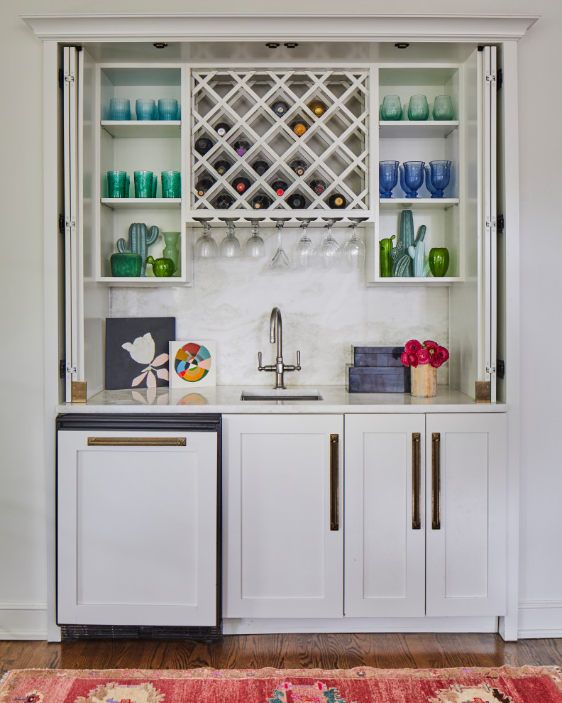 Example of a transitional home bar design in Other