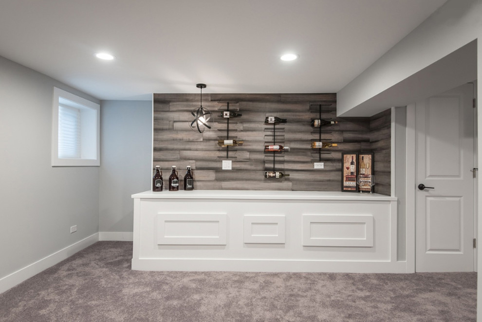 Inspiration for a medium sized contemporary single-wall home bar in Chicago with white cabinets, wood worktops, multi-coloured splashback, wood splashback, carpet, brown floors and white worktops.
