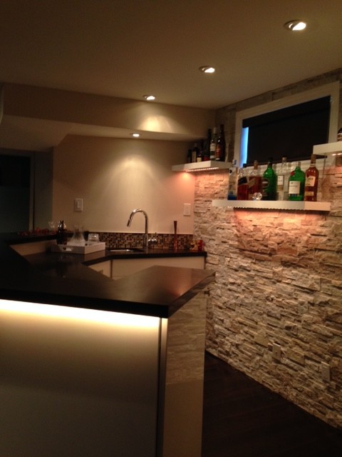 Photo of a medium sized contemporary home bar in Toronto.