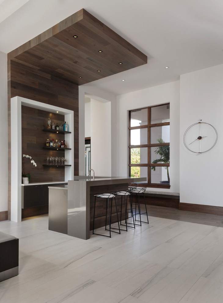 Design ideas for a medium sized modern l-shaped breakfast bar in Miami with flat-panel cabinets, beige floors, a submerged sink, brown cabinets, wood splashback and brown splashback.