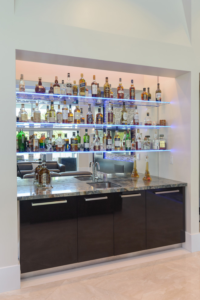Photo of a contemporary home bar in Miami.