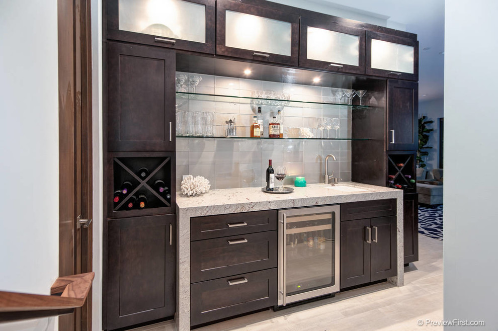 Example of a mid-sized minimalist porcelain tile home bar design in San Diego