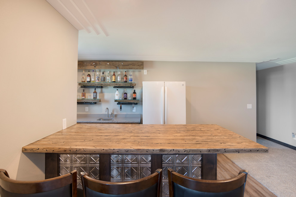 Medium sized rustic single-wall breakfast bar in Other with a submerged sink, raised-panel cabinets, medium wood cabinets, wood worktops, medium hardwood flooring, brown floors and beige worktops.