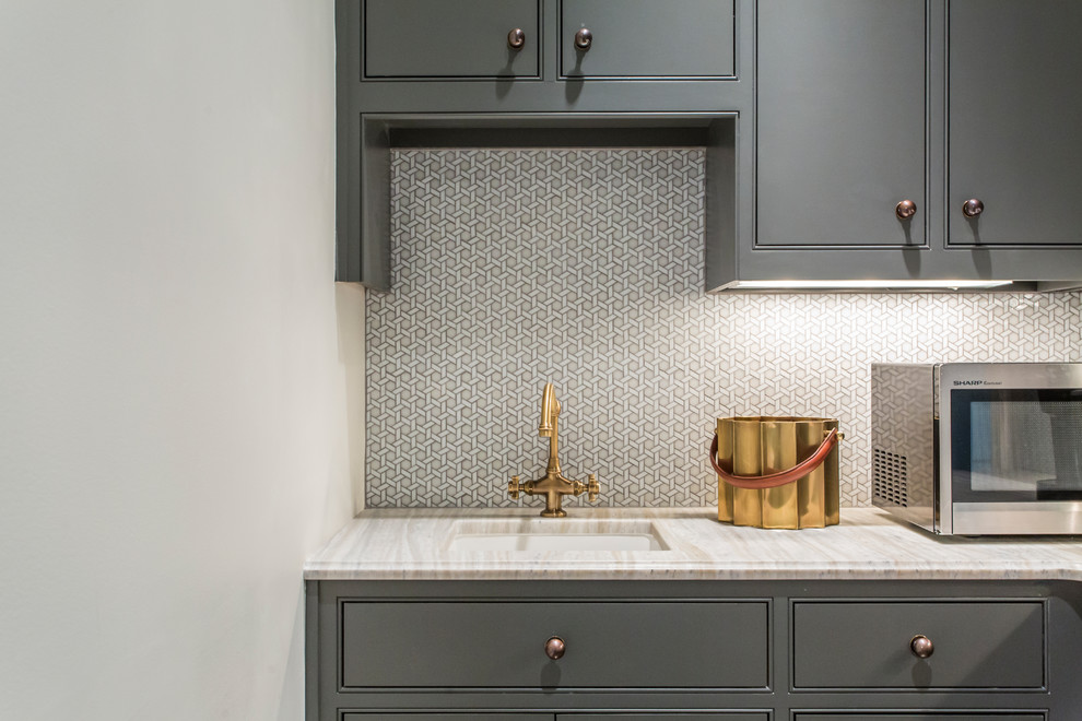 Design ideas for a traditional wet bar in Atlanta with a submerged sink, beaded cabinets, grey cabinets, grey splashback and mosaic tiled splashback.