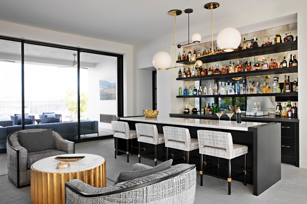 Design ideas for a contemporary home bar in San Diego.