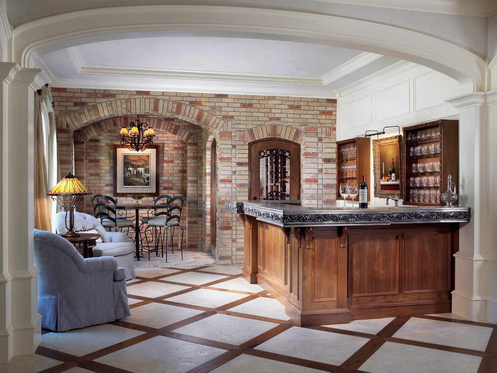 Inspiration for a mid-sized timeless u-shaped seated home bar remodel in Atlanta with recessed-panel cabinets and medium tone wood cabinets
