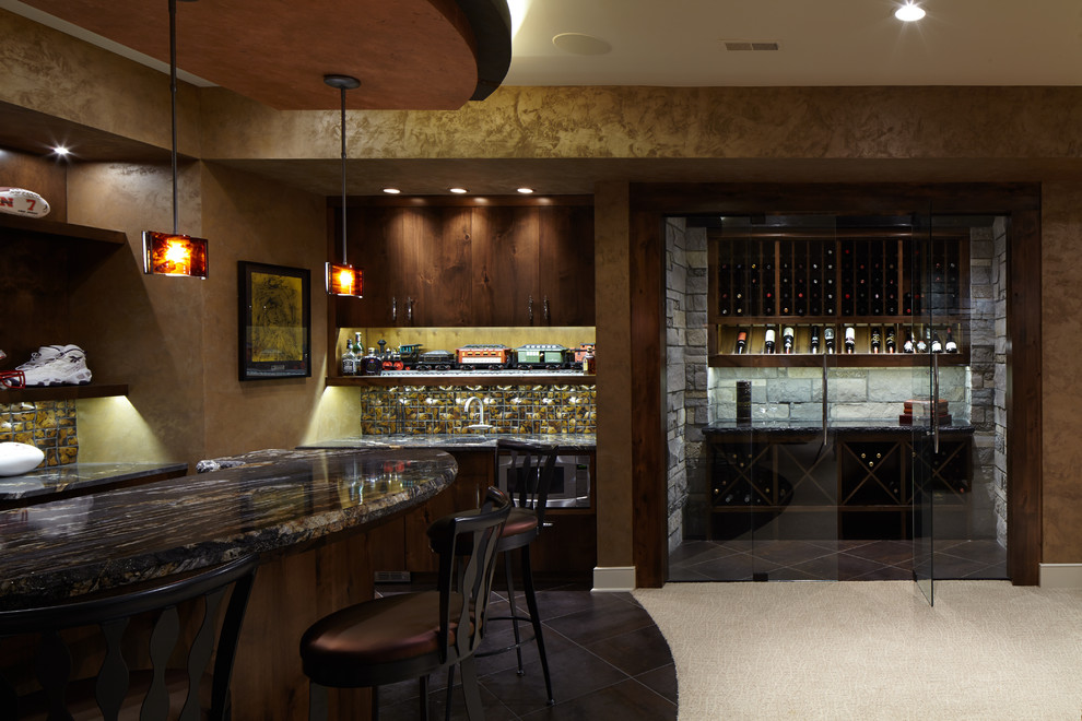 Inspiration for a large traditional home bar in Omaha.