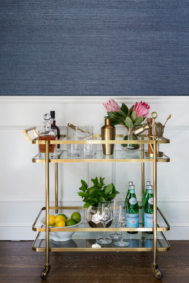 This is an example of a small nautical bar cart in San Francisco with dark hardwood flooring and brown floors.