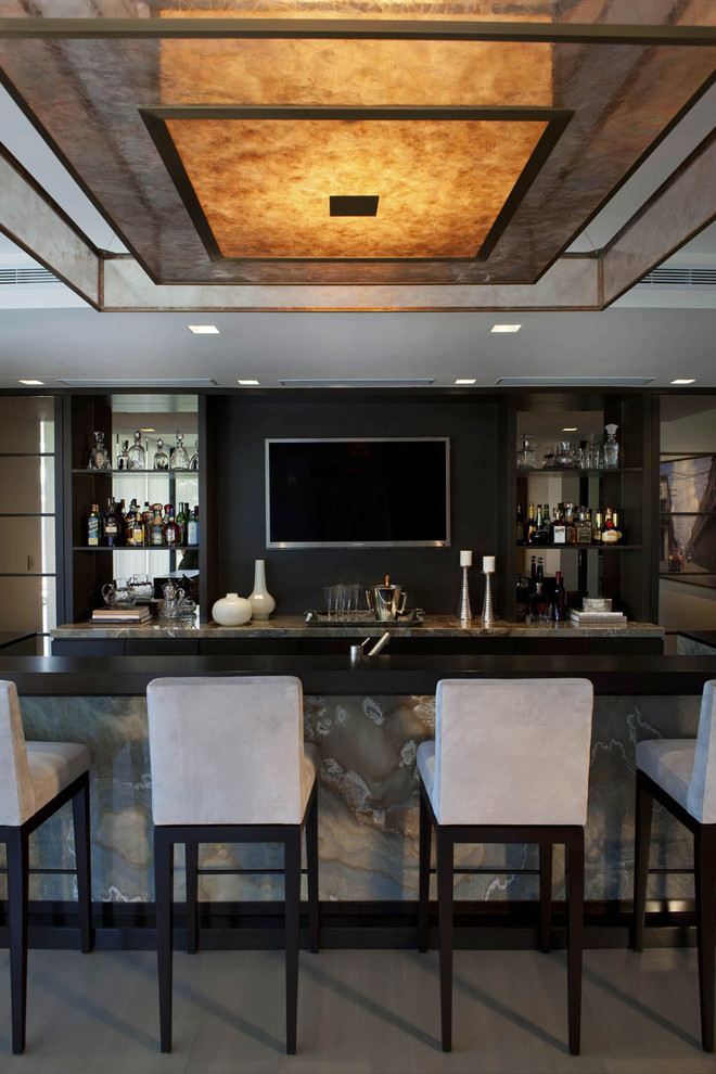 Seated home bar - contemporary seated home bar idea in Miami with black backsplash