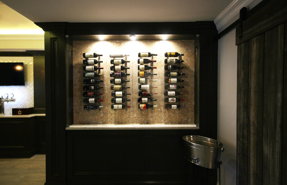 This is an example of a medium sized classic wine cellar in New York with porcelain flooring and brown floors.