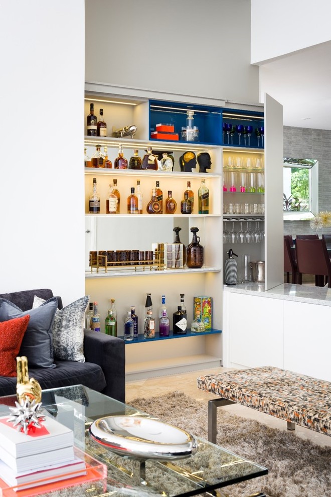 Photo of a small contemporary home bar in Miami with open cabinets and white cabinets.