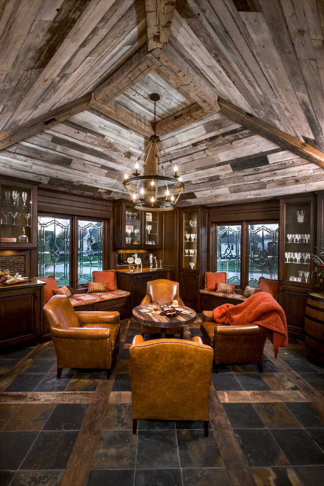 Inspiration for a large eclectic breakfast bar in Cincinnati with copper worktops, dark wood cabinets and glass-front cabinets.