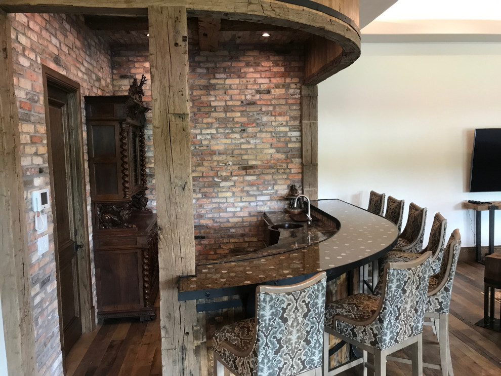 Example of a mountain style home bar design in Dallas