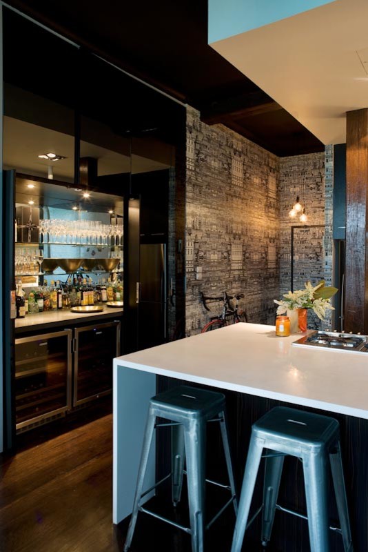 Design ideas for a medium sized modern single-wall wet bar in Sydney with a submerged sink, black cabinets, marble worktops, grey splashback, mirror splashback and dark hardwood flooring.