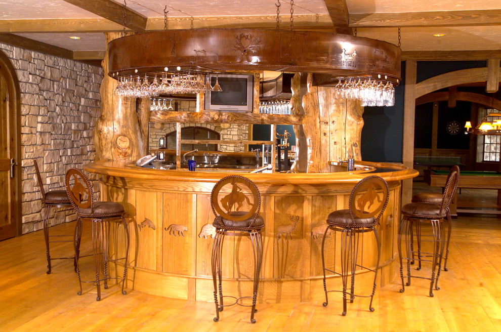 Example of a mountain style home bar design in Other