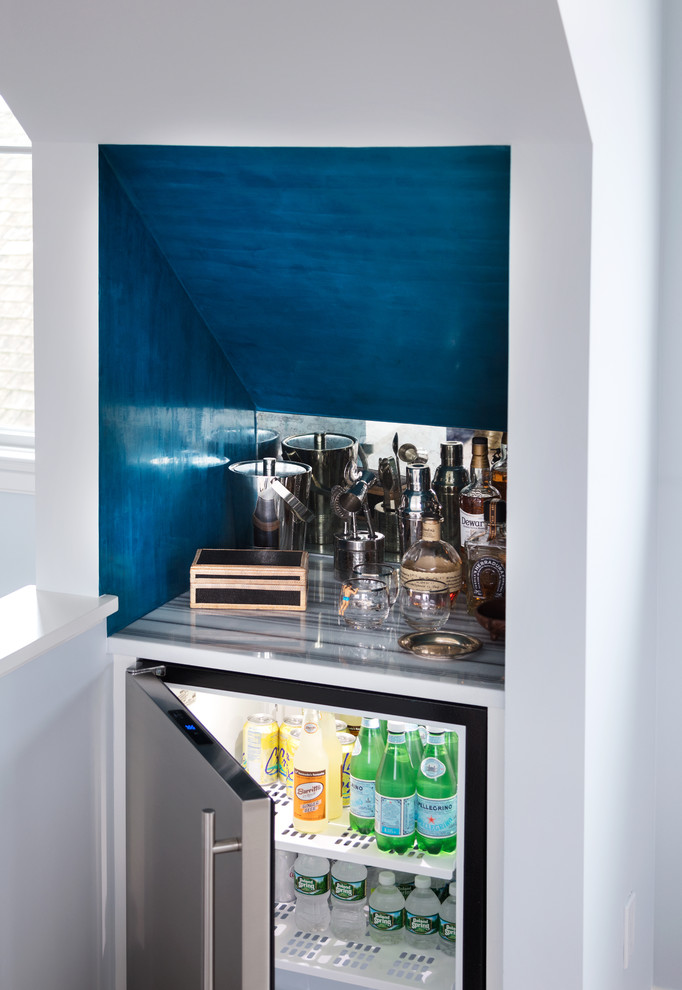 Home bar - small coastal single-wall home bar idea in New York with quartz countertops, gray backsplash and metal backsplash