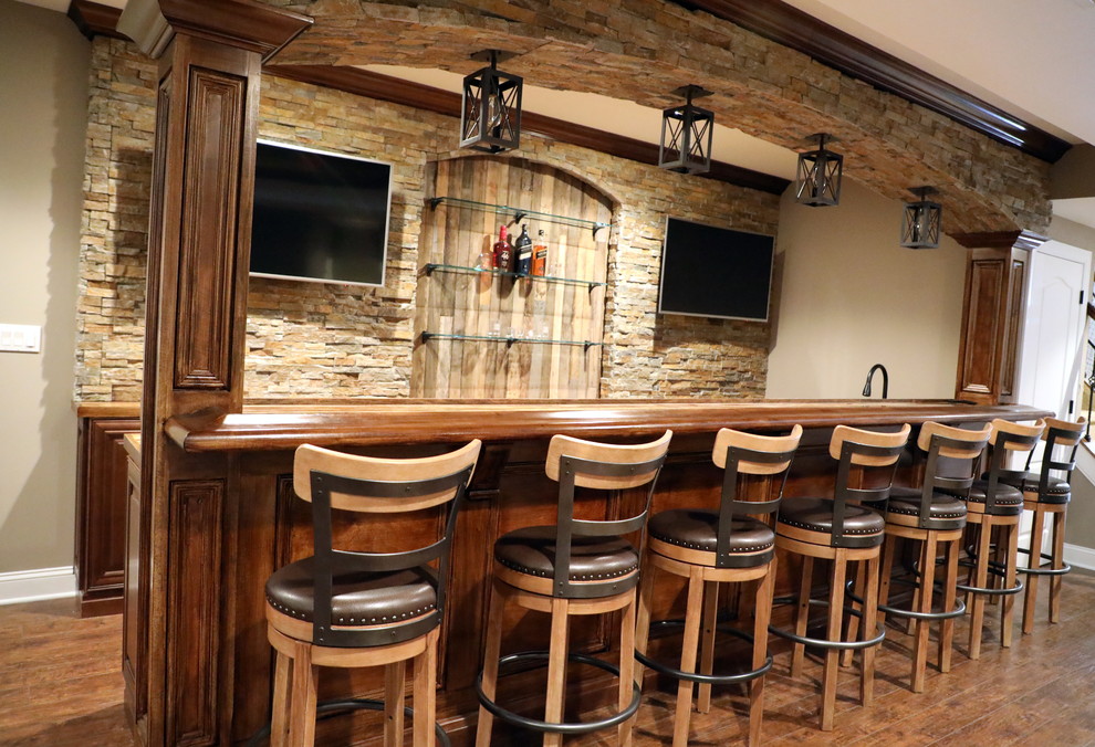 Rustic style basement bar. Rustic Home Bar New York by