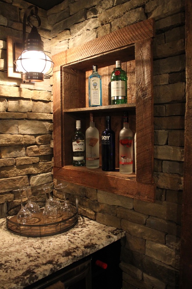 Example of a mid-sized mountain style single-wall porcelain tile and brown floor seated home bar design in Boston with an undermount sink, brown backsplash, stone tile backsplash, granite countertops and beige countertops