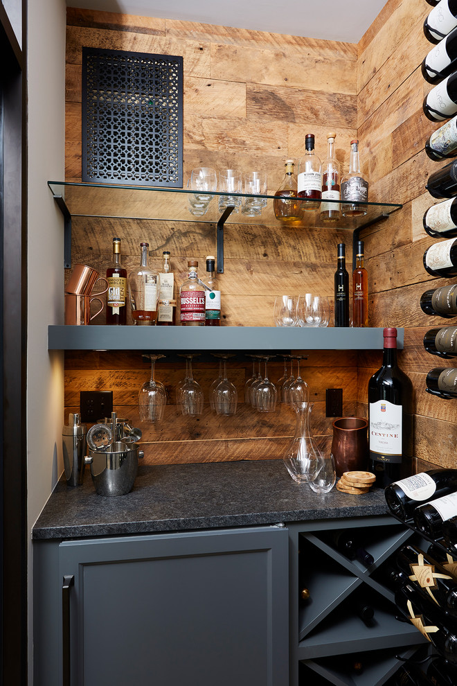 Small coastal single-wall home bar in Minneapolis with no sink, grey cabinets, wood splashback and grey worktops.