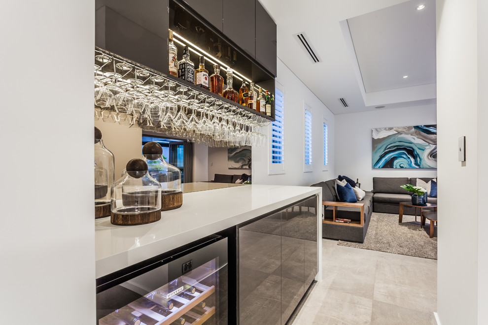 Example of a trendy home bar design in Perth