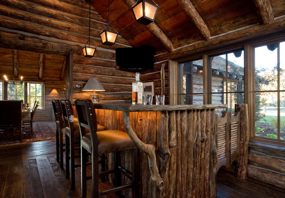 Mountain style home bar photo in Other