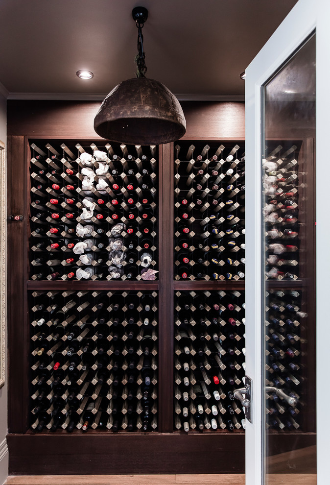 Example of a huge eclectic wine cellar design in Sydney