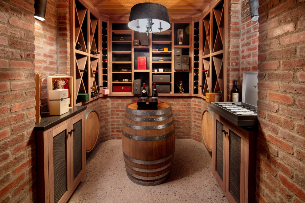 Photo of a medium sized urban wine cellar in Toronto with beige floors.