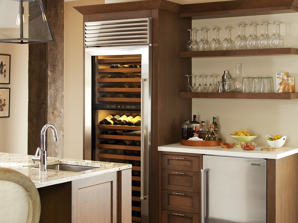Small minimalist wet bar photo in Boston with an undermount sink, shaker cabinets, dark wood cabinets and solid surface countertops