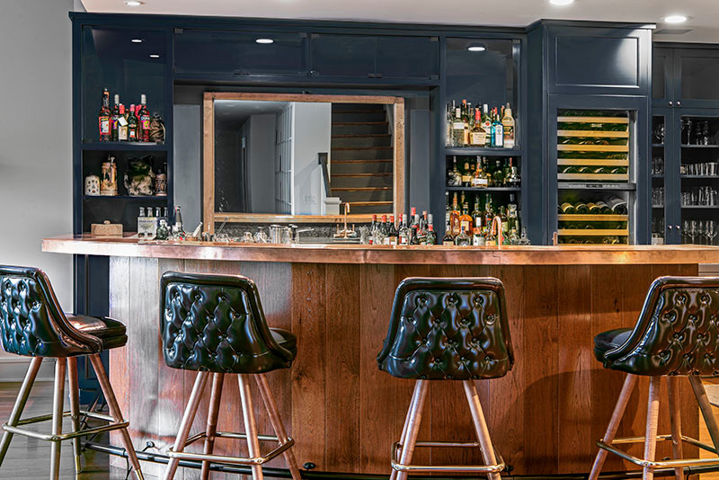 Photo of a traditional home bar in Other with copper worktops.