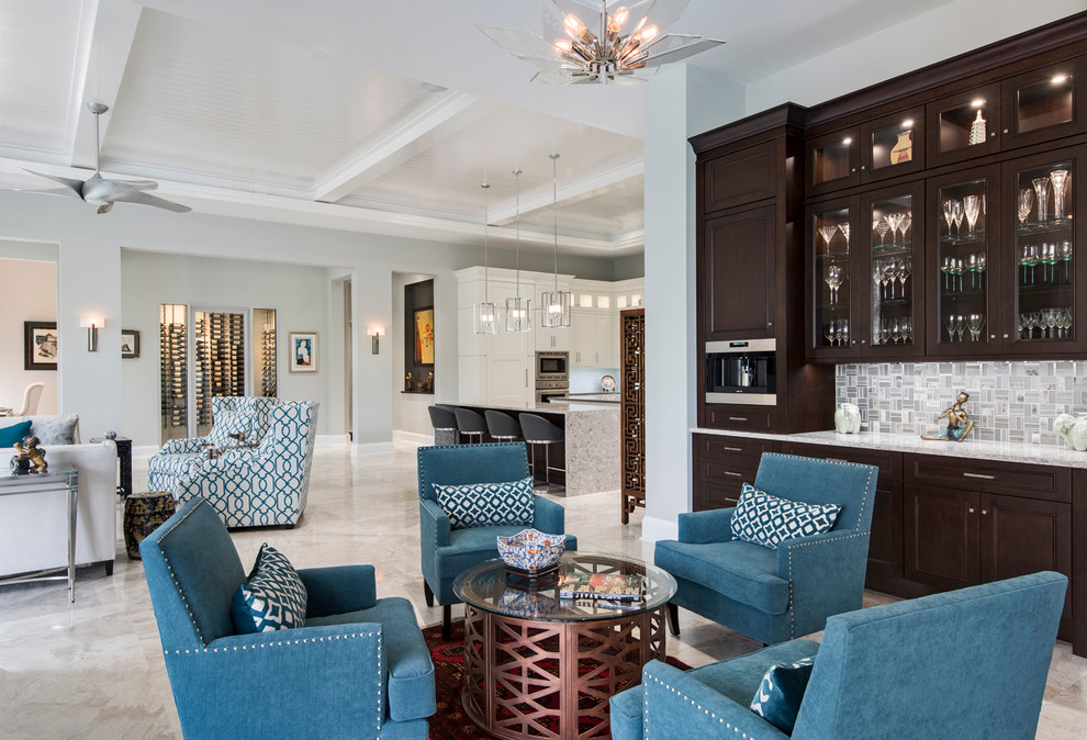 Example of a mid-sized transitional single-wall travertine floor home bar design in Miami with recessed-panel cabinets, dark wood cabinets, marble countertops, gray backsplash and mosaic tile backsplash
