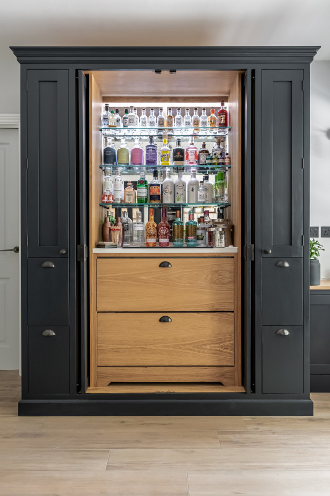 Design ideas for a classic home bar in Surrey.