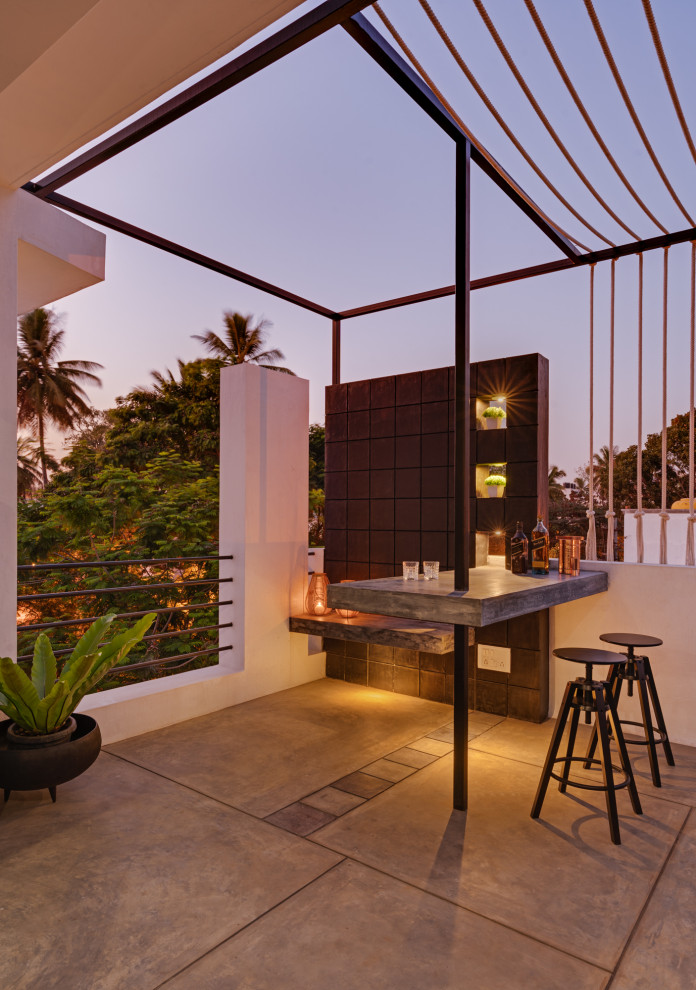 Example of a minimalist home bar design in Bengaluru