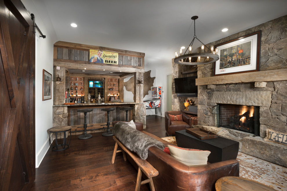 Example of a mountain style home bar design in Other