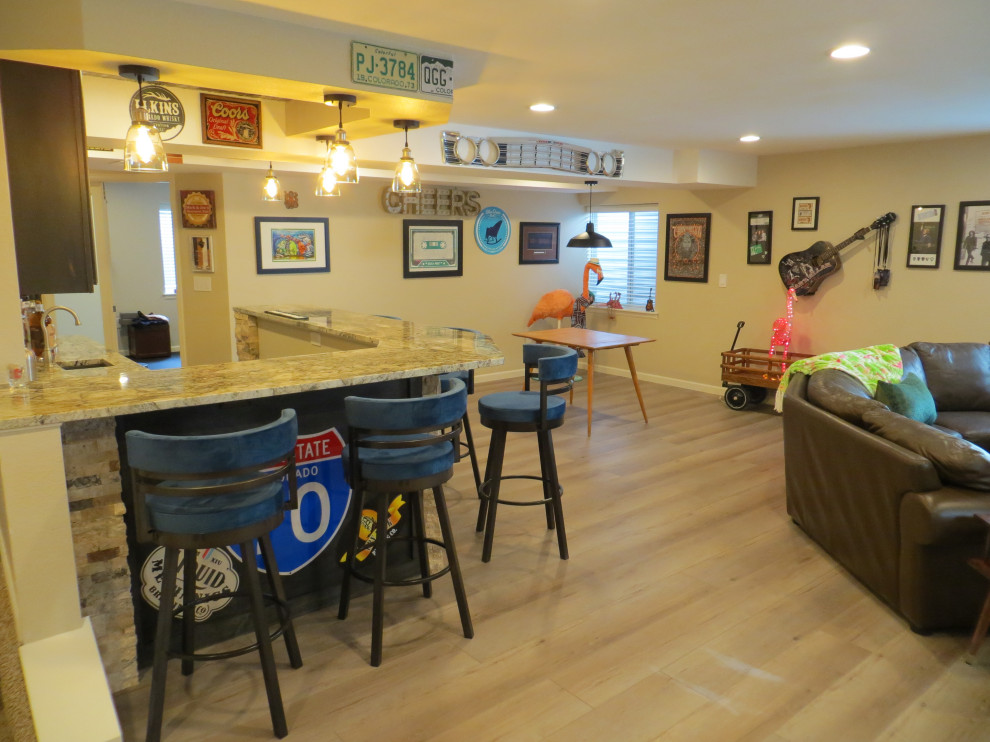 Inspiration for an eclectic home bar remodel in Denver