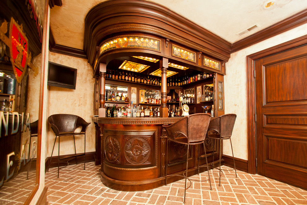 This is an example of a traditional home bar in Raleigh.