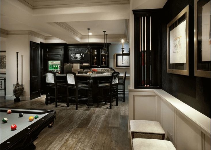 This is an example of an expansive traditional home bar in Phoenix with medium hardwood flooring.