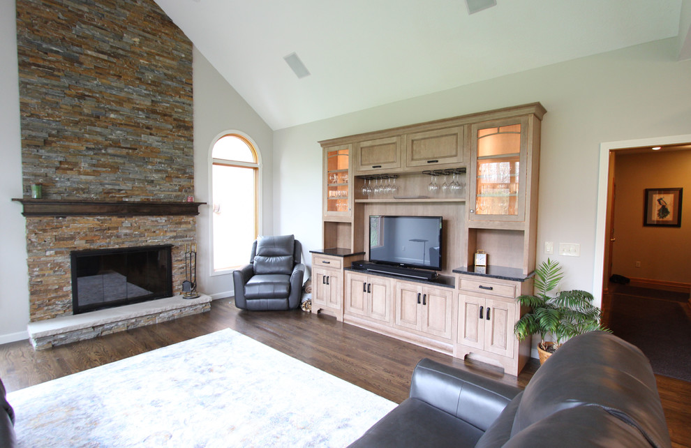 Two Toned Kitchen With White Island And Great Room Stacked Stone Fireplace Home Bar Cleveland By Cabinet S Top - White Stacked Stone Fireplace Pictures