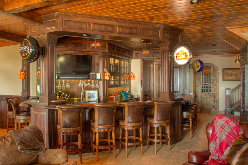 Photo of a large traditional home bar in Minneapolis.