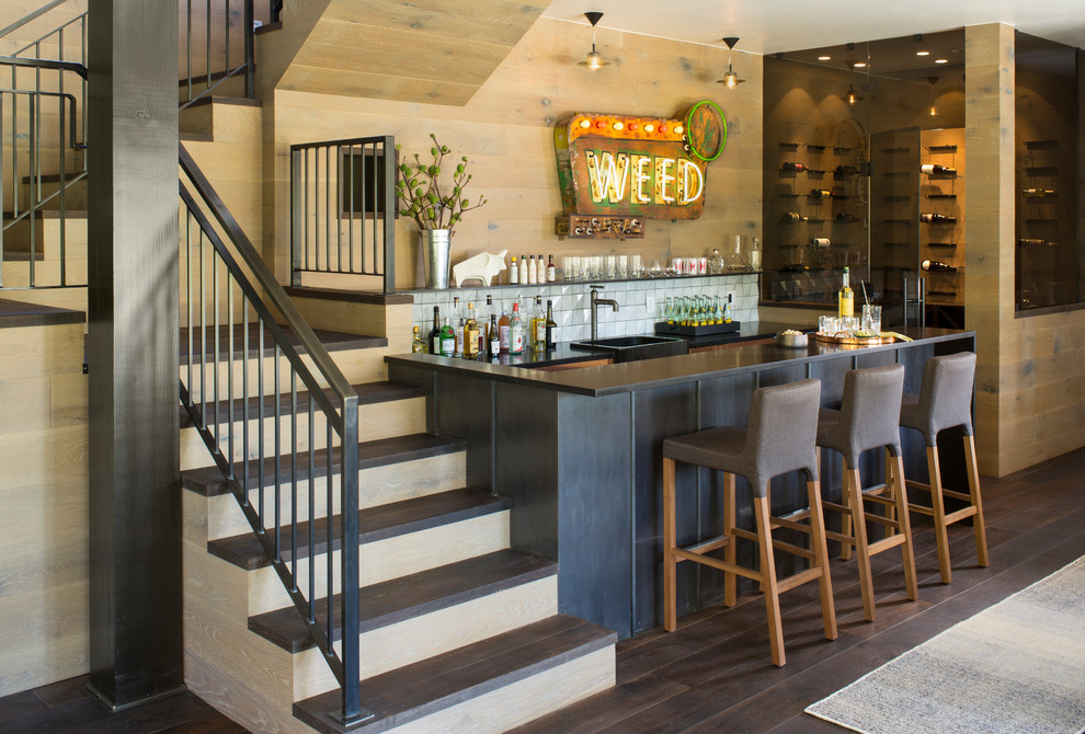 Example of a large trendy dark wood floor home bar design in Denver