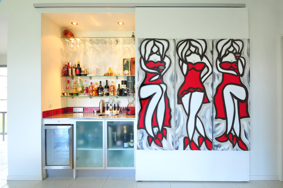 Photo of a small contemporary single-wall home bar in Brisbane with a built-in sink, glass-front cabinets, engineered stone countertops, red splashback, ceramic splashback and porcelain flooring.